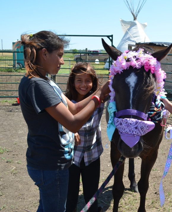 Horse Camp participant with a horse