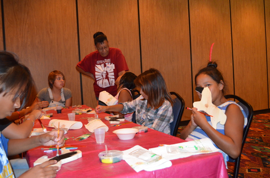 Children doing crafts at Kid's Club